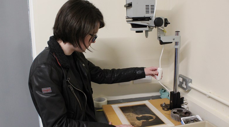 A student developing an image.